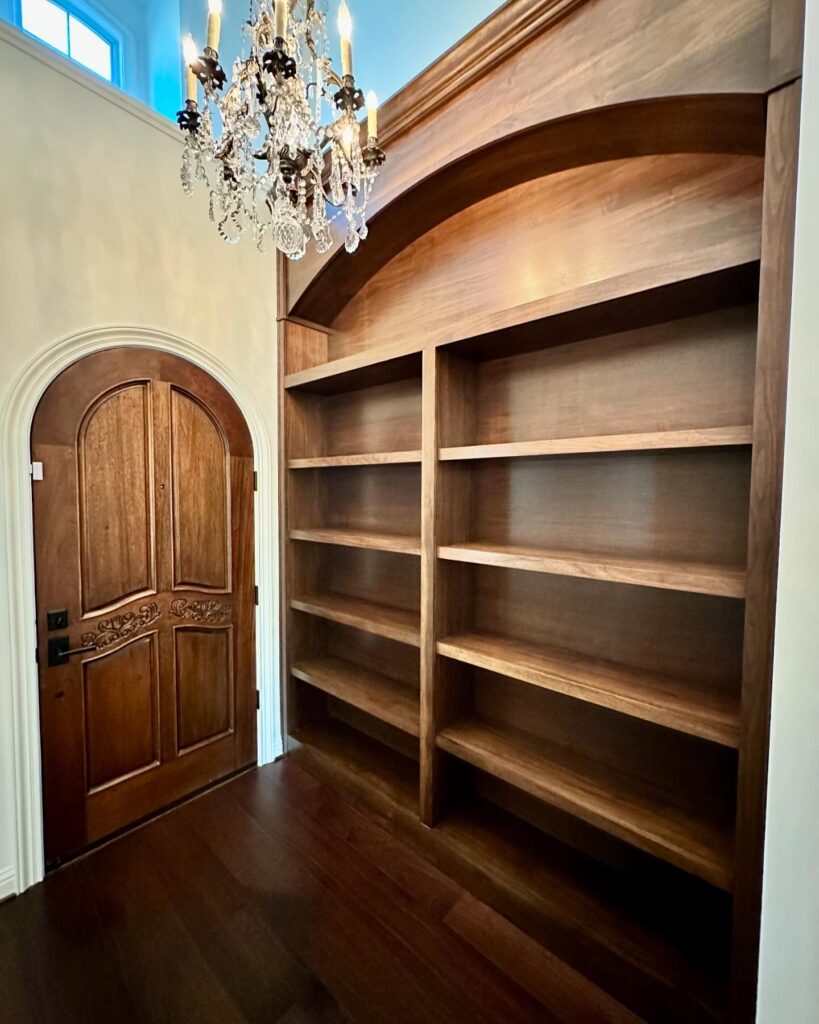 Built-in Bookcase with Arched Top in Walnut