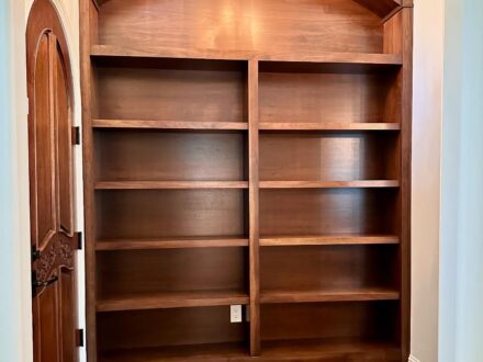 Builtin Walnut Bookcase with Arched Top