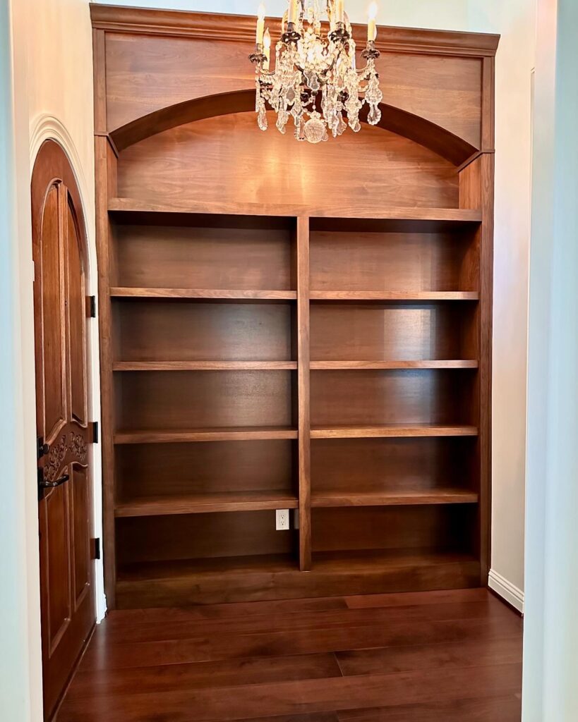 Builtin Walnut Bookcase with Arched Top