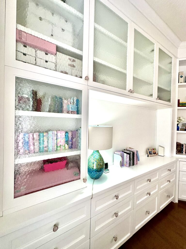 Custom Home Office Built ins with glass cabinets and drawers