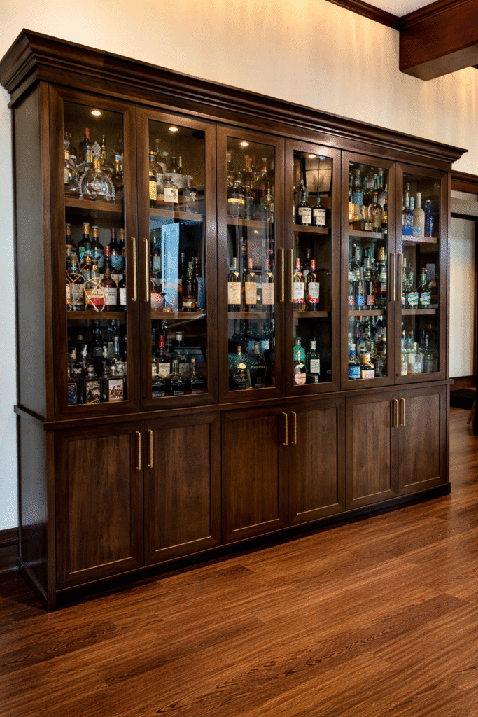 Walnut Liquor Cabinet with Glass Doors and Stepped Shelves